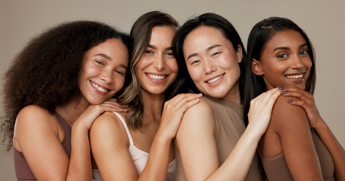 Image of women smiling at the camera, they promote skincare and probably show/have different skin types
