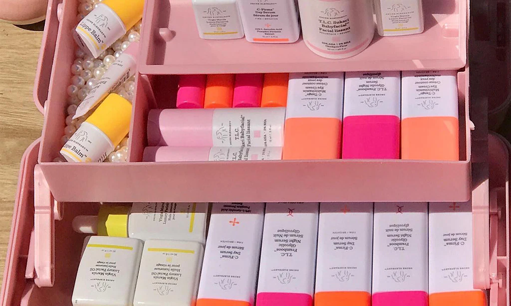 Image of skincare products and tools to help you know your skin type to know what to do