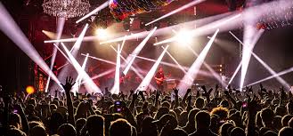 Stage lights and crowd at a live concert
